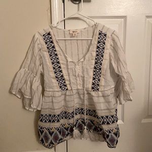 Womens flow designed tassel top